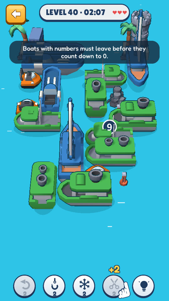 Classic mode: boats of different lengths on a crowded grid, with rocks and a target buoy between them
